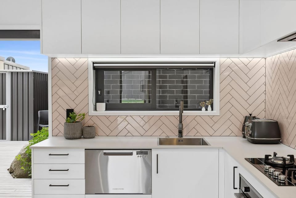 Kitchen or kitchenette, dishwasher, stove, toaster