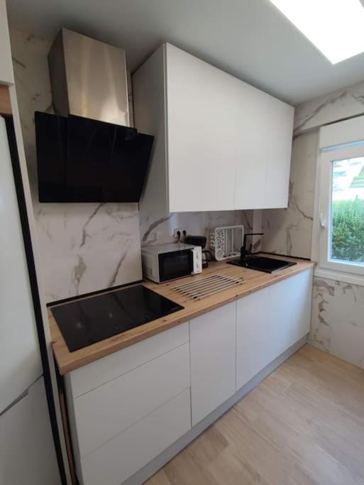 Kitchen or kitchenette, stove