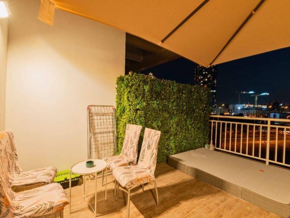 Property building, Patio, Night, View (from property/room), Balcony/Terrace, Living room, Seating area, sunbed