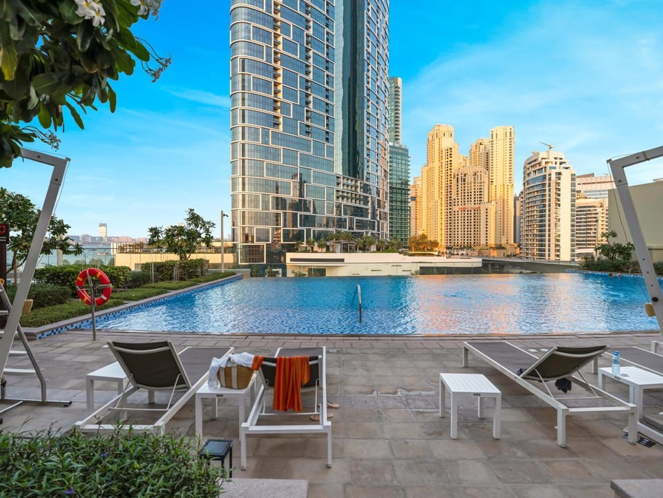 Patio, Day, City view, Pool view, Swimming pool, sunbed