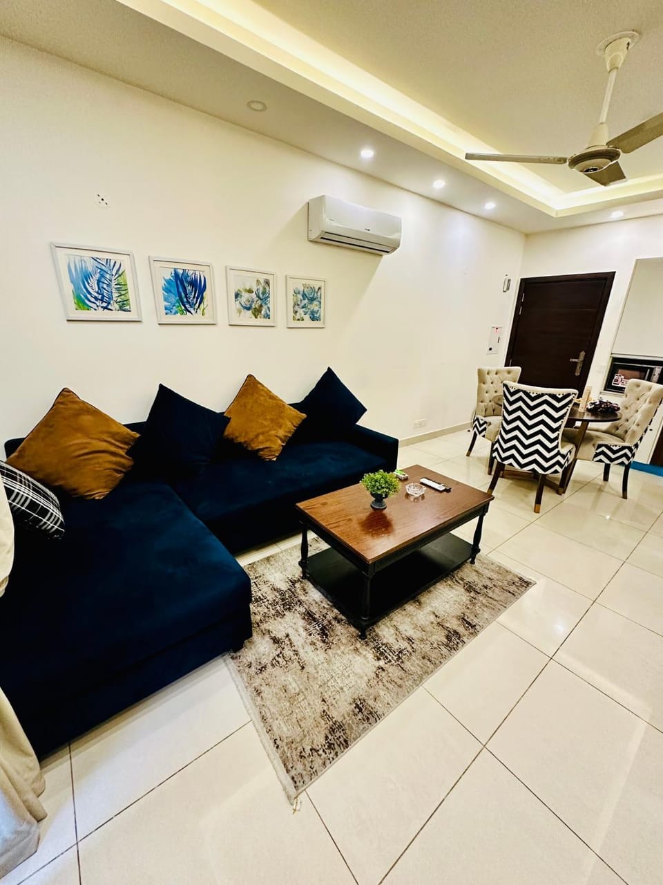 TV and multimedia, Living room, Seating area, fireplace, air conditioner