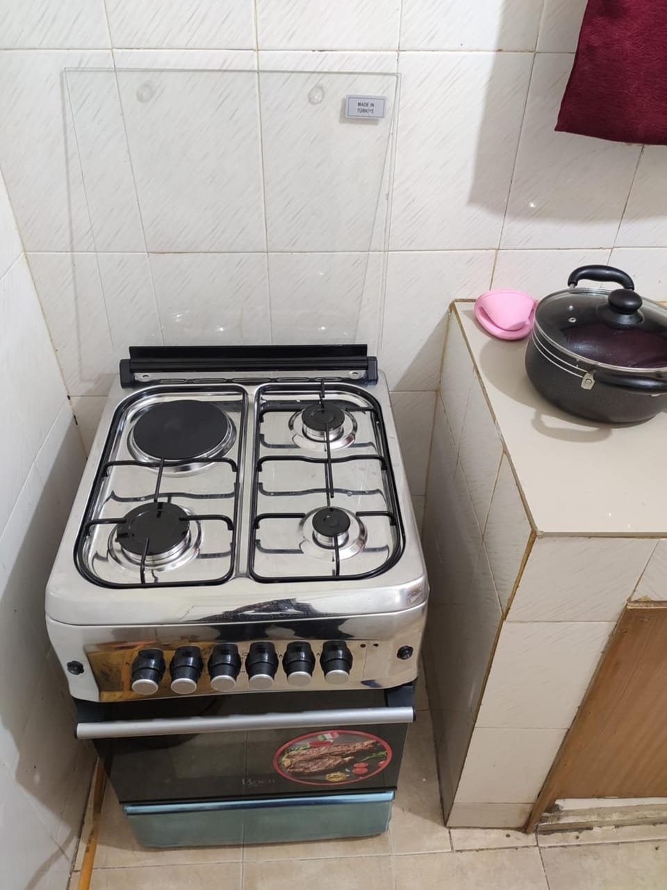 Kitchen or kitchenette, oven, stove