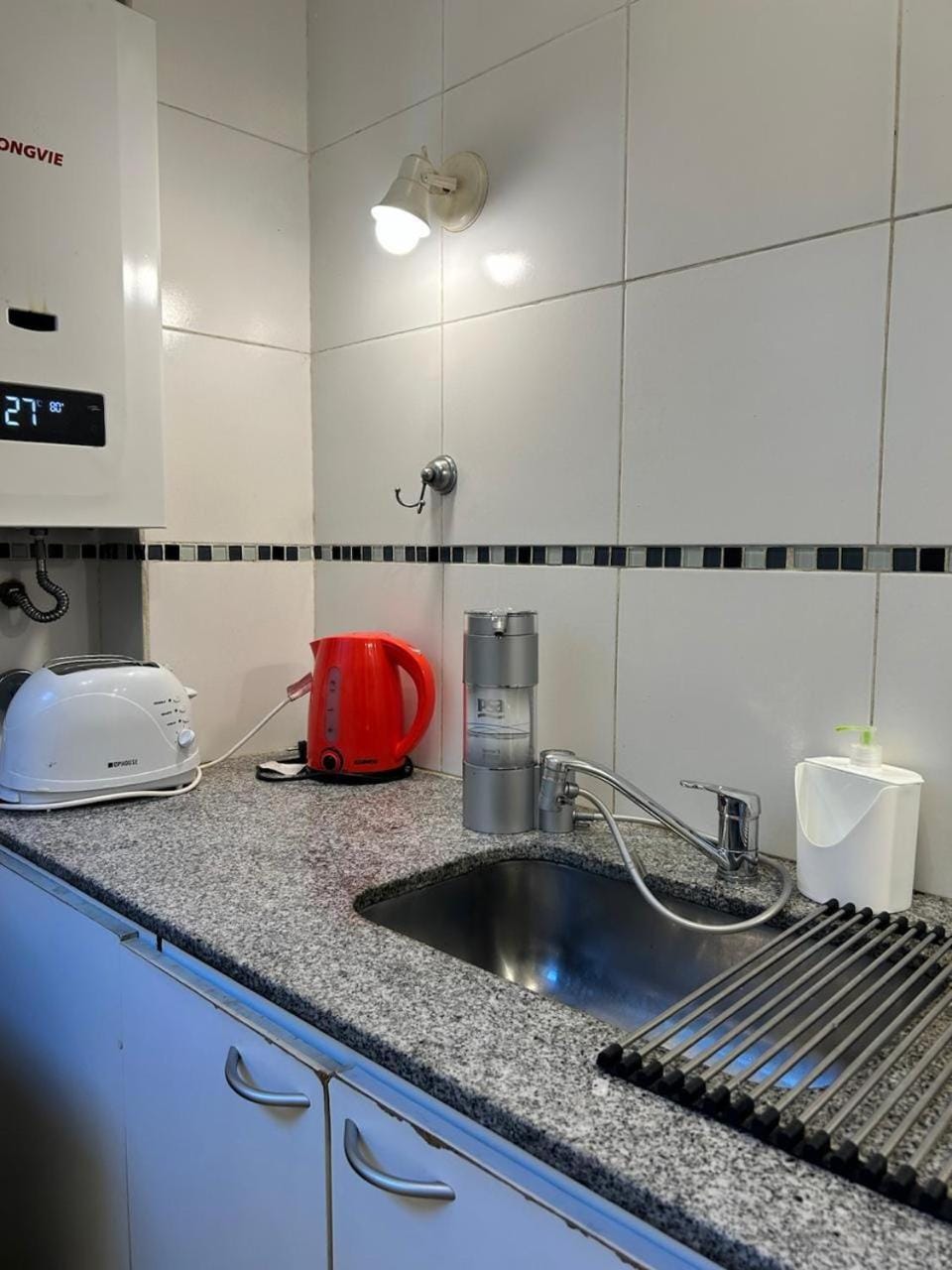 Kitchen or kitchenette, toaster