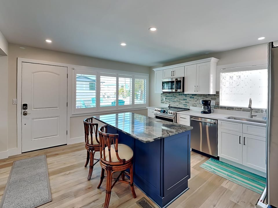 Kitchen or kitchenette, dishwasher, microwave, oven, stove, toaster, kitchen