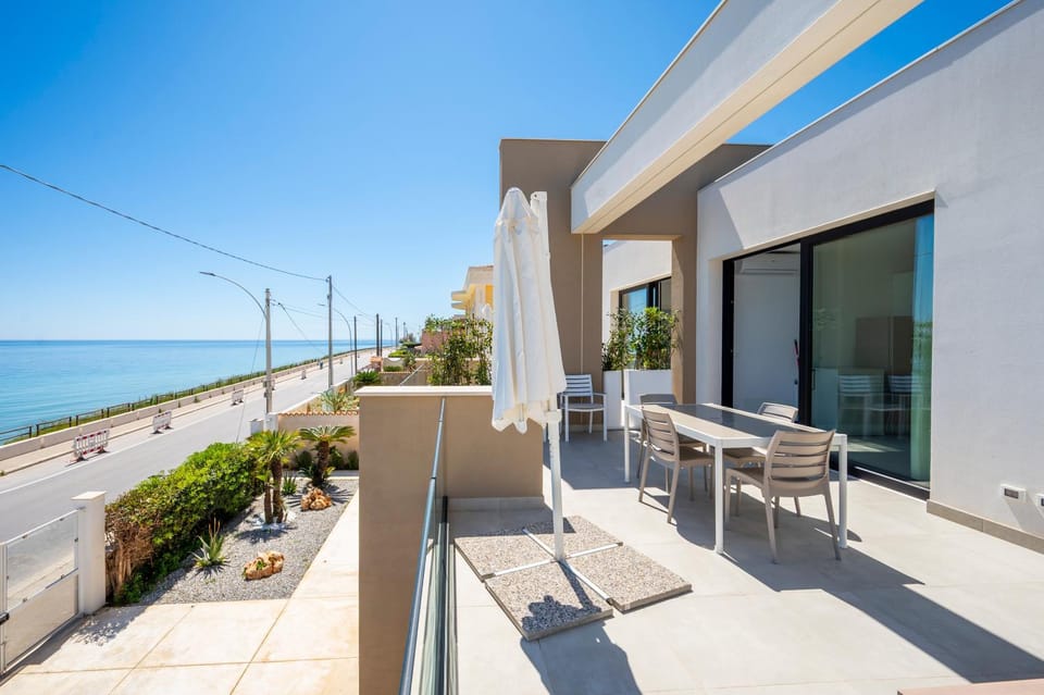 Property building, Patio, View (from property/room), Balcony/Terrace, Beach, Sea view
