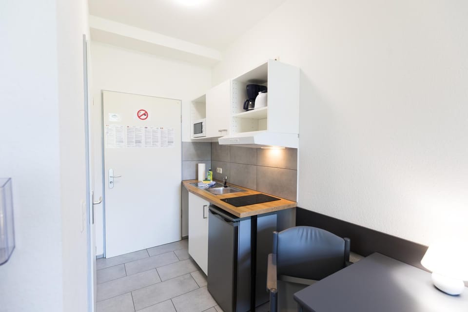 Kitchen or kitchenette, stove