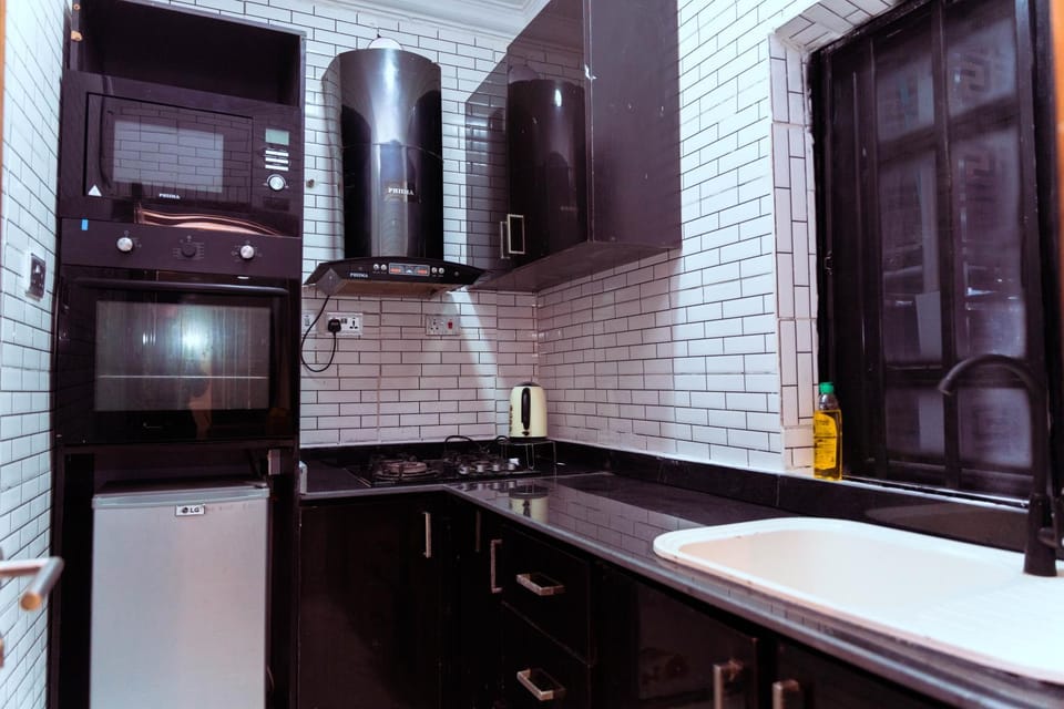 Kitchen or kitchenette, oven, stove