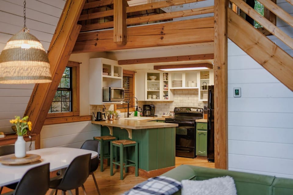 Big Mountain View! Downtown Gatlinburg Chalet Village! Hot Tub! Fan Favorite! AFrame Dreams! Magazine-Featured! Stunning Interiors! Little Green Cabin Cabin in Chalet Village