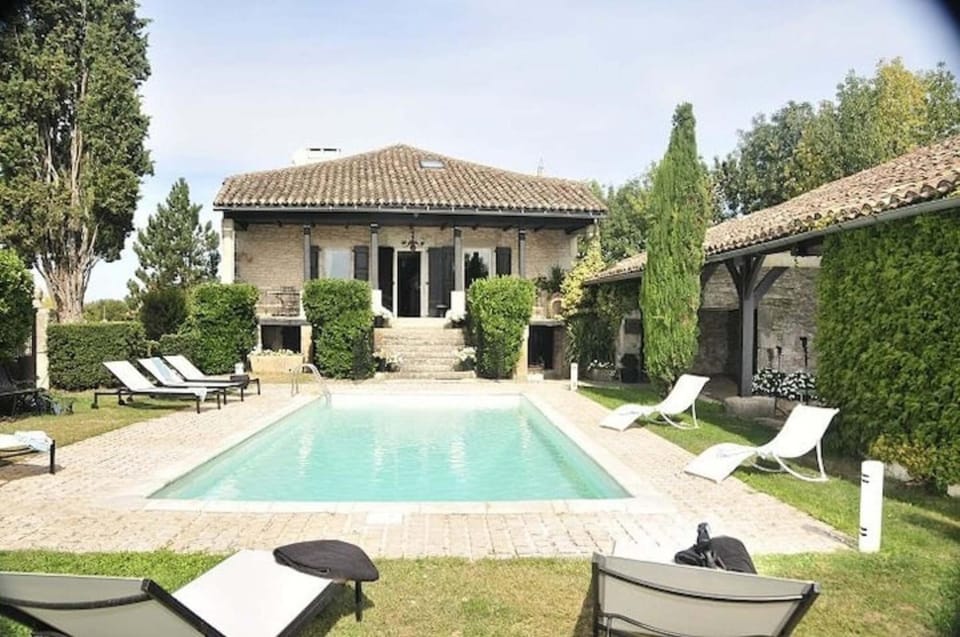 Property building, Living room, Swimming pool