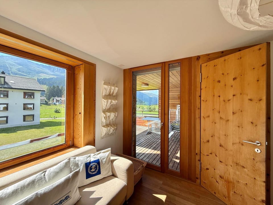 Ski Apartment with Fireplace & Mountain Views Apartment in Canton of Grisons