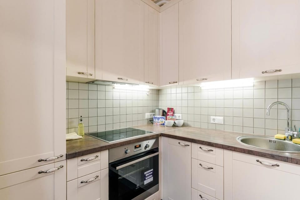 Kitchen or kitchenette, oven, stove