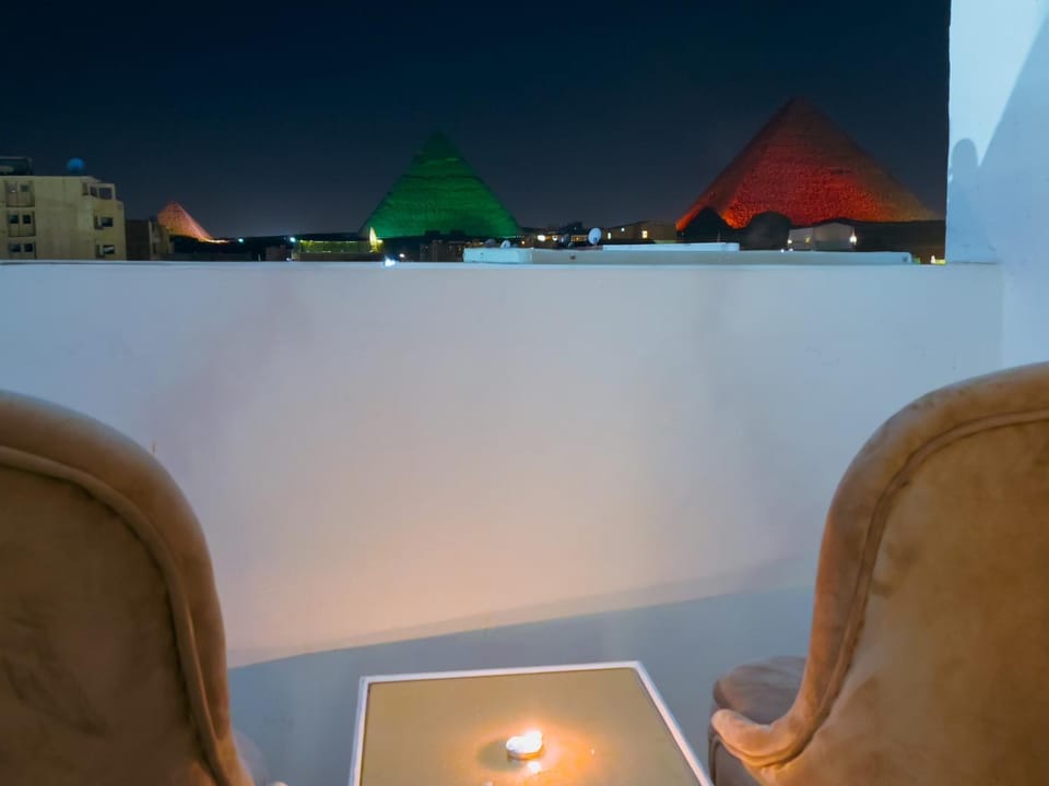 View (from property/room), Balcony/Terrace, Living room, Seating area, Landmark view