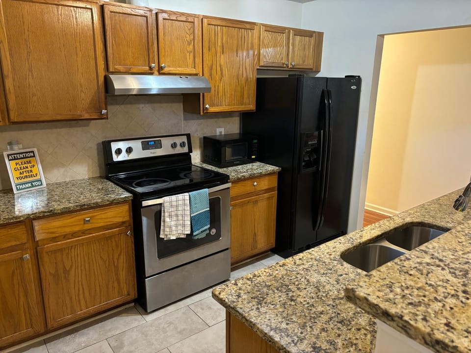 Kitchen or kitchenette, dishwasher, stove