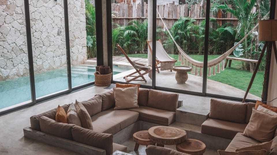 Patio, Living room, Seating area, Pool view, Swimming pool