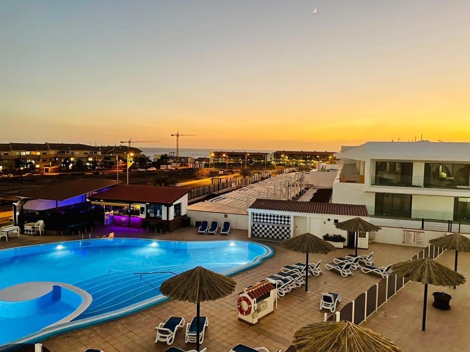 Pool view, Swimming pool, Sunset, sunbed