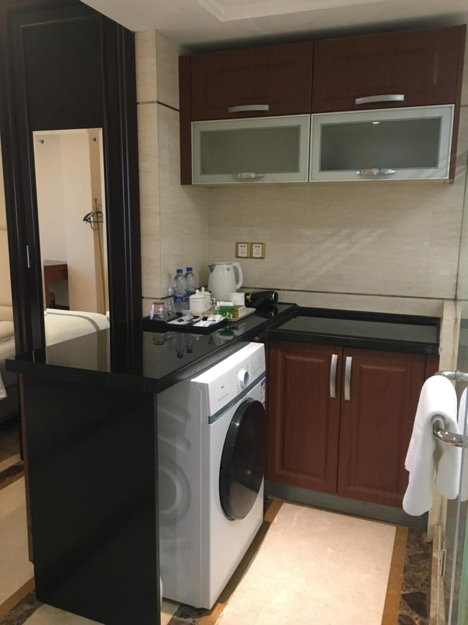 Kitchen or kitchenette, washing machine