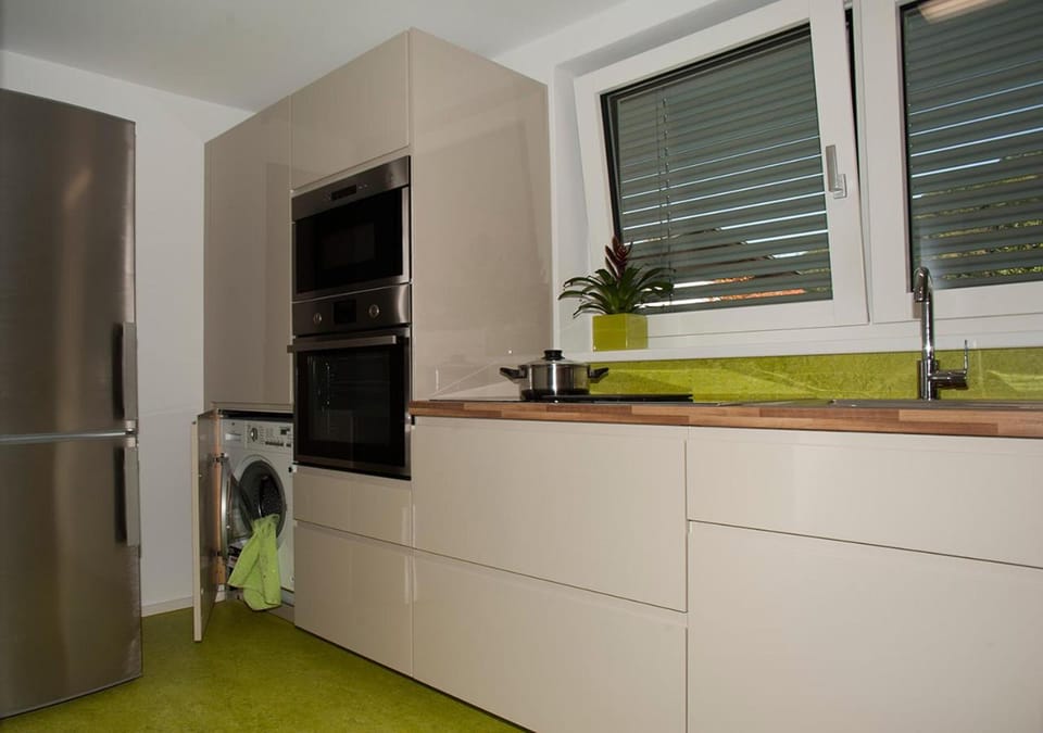 Kitchen or kitchenette, washing machine