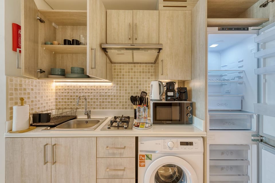 Kitchen or kitchenette, stove, toaster