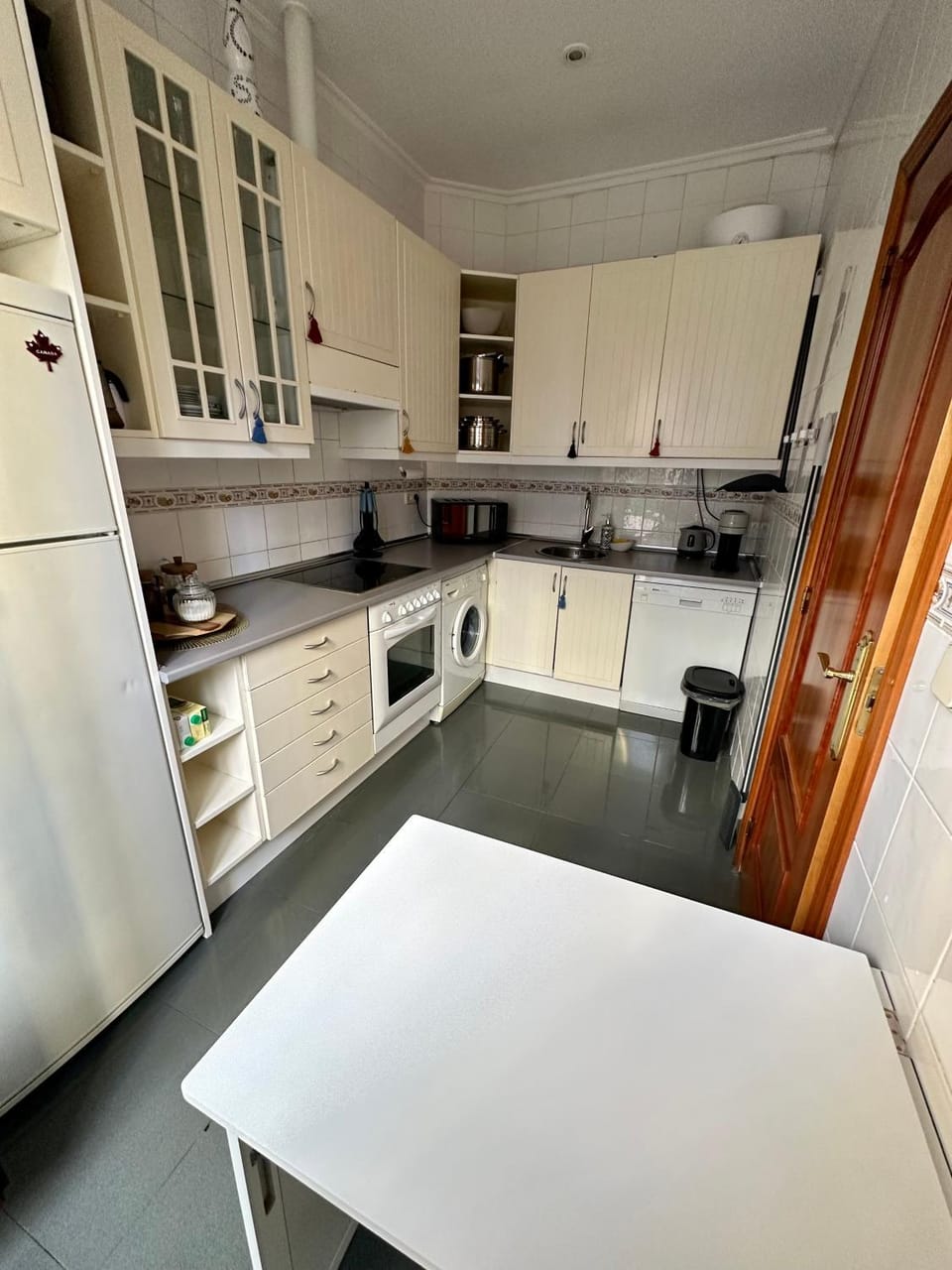 Kitchen or kitchenette, Dining area, dishwasher, oven, stove, washing machine