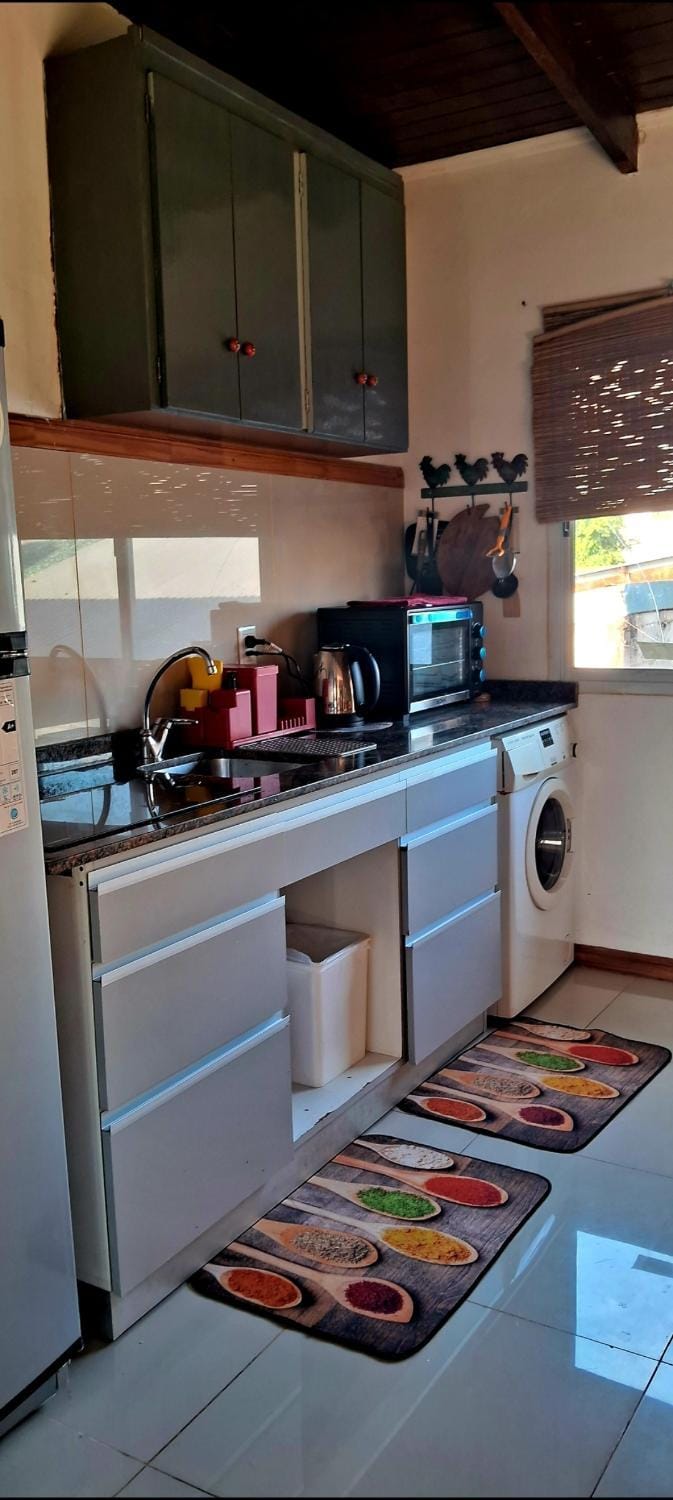 Kitchen or kitchenette, oven, stove