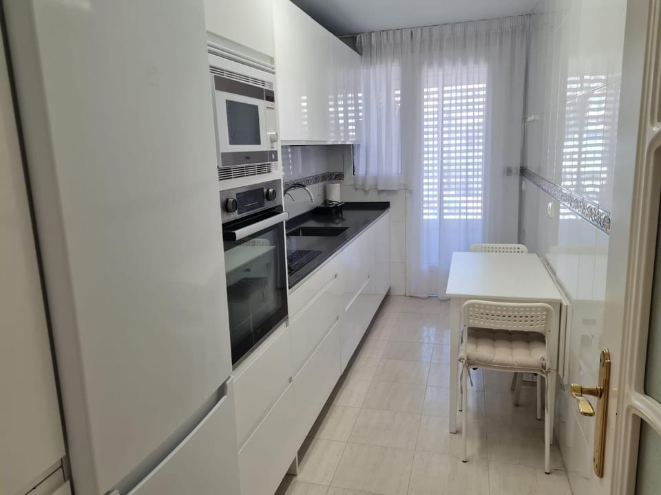 Kitchen or kitchenette, oven, stove