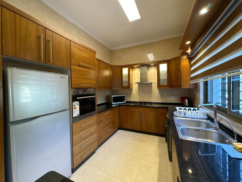 Kitchen or kitchenette, oven, stove