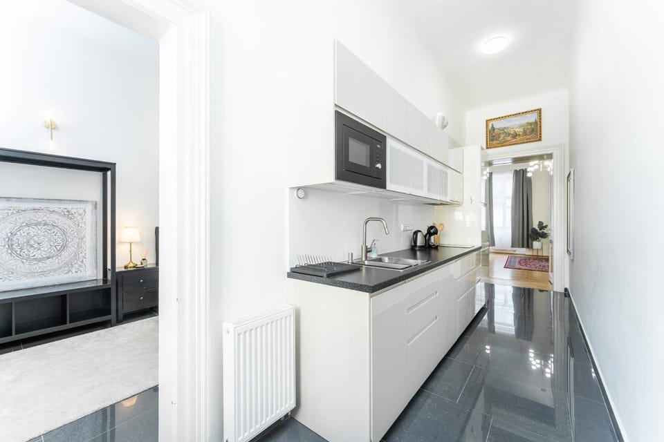 Kitchen or kitchenette, dishwasher, oven, stove, toaster