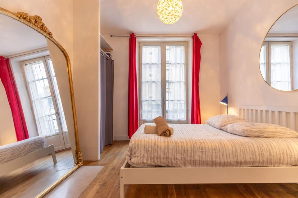 Bed, towels, wardrobe