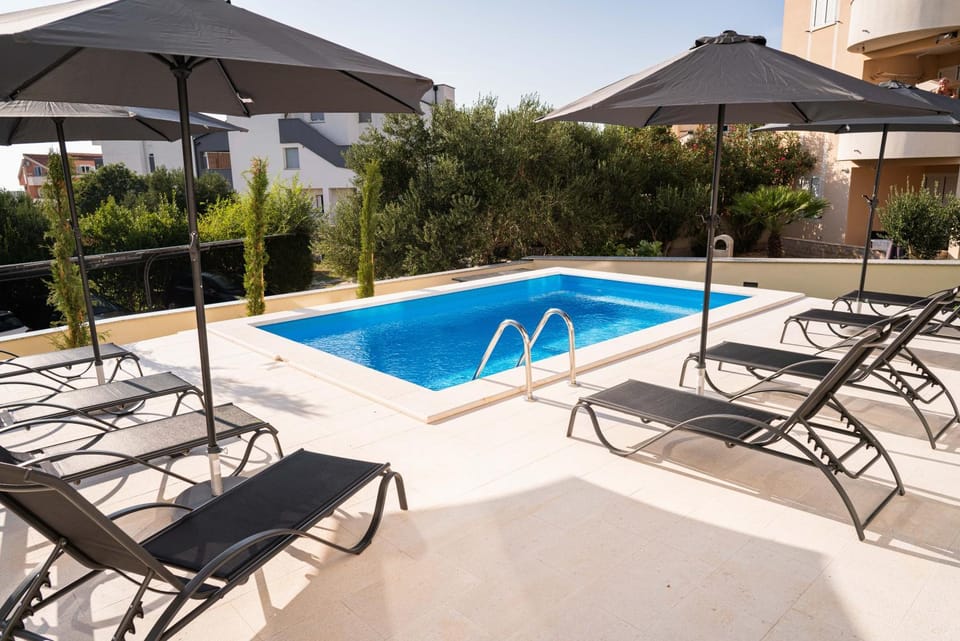 Day, Pool view, Swimming pool, sunbed
