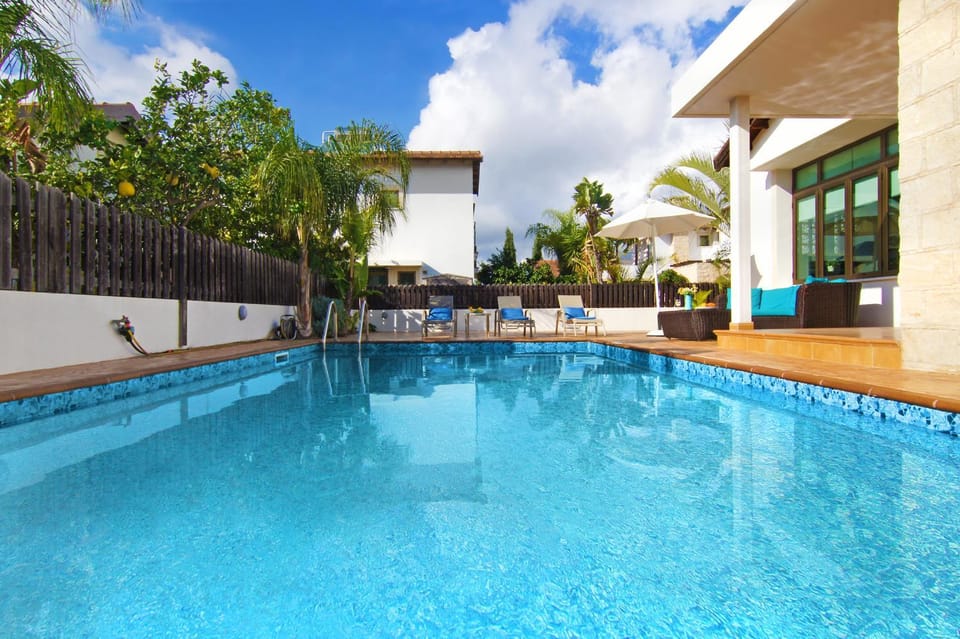 Property building, Patio, Swimming pool, sunbed