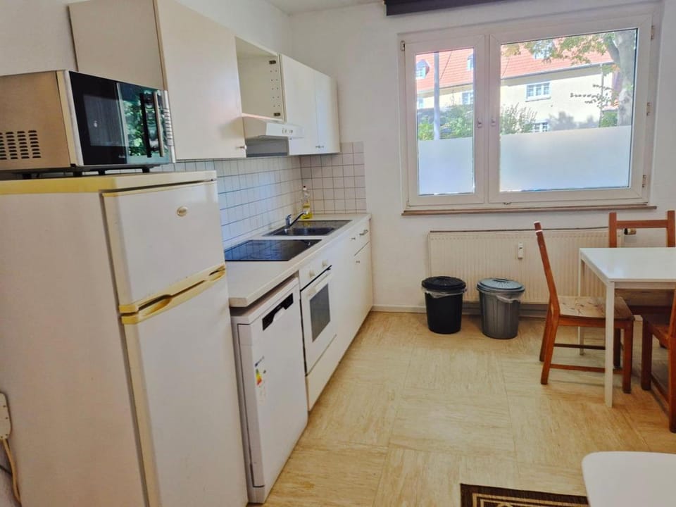 Kitchen or kitchenette, Dining area, dishwasher, microwave, oven, stove