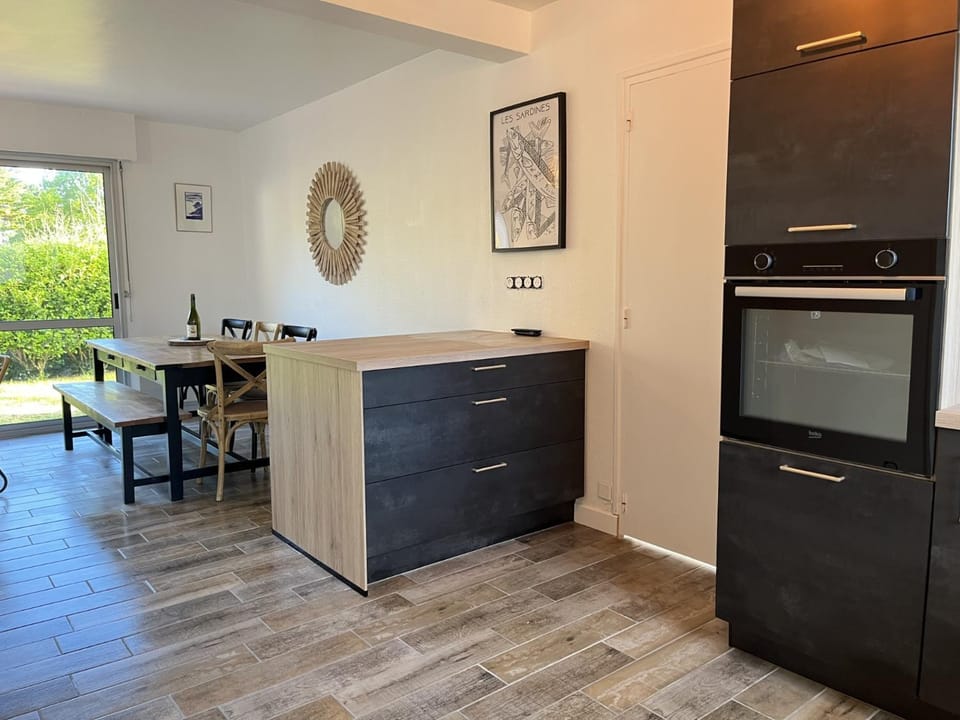 Dining area, dishwasher, oven, kitchen
