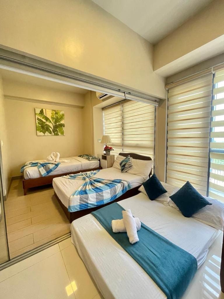 Budget friendly 1bedroom in The Mactan Newtown with pool&beach access Apartment in Lapu-Lapu City