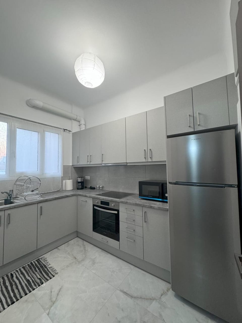 Kitchen or kitchenette, dishwasher, oven, stove