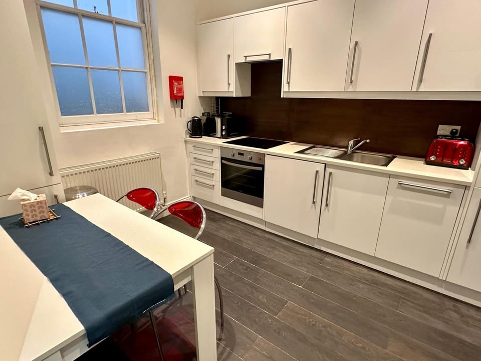 Kitchen or kitchenette, oven
