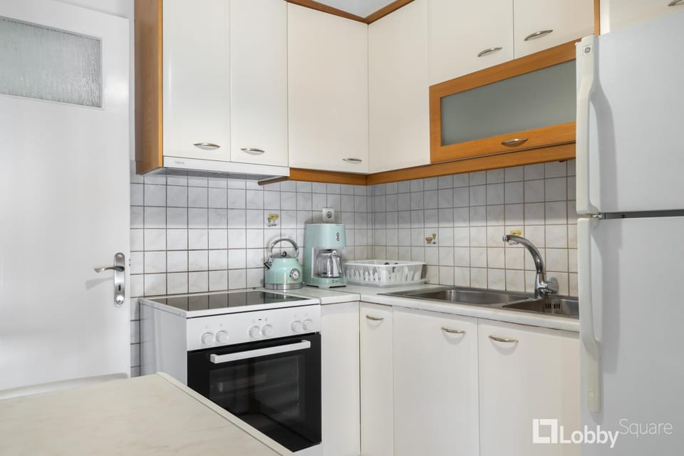 Nus Apartment by LobbySquare Apartment in Athens