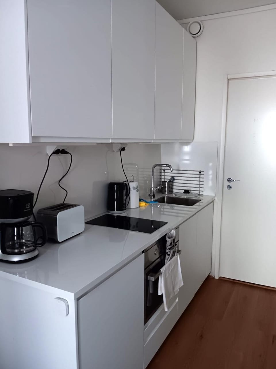 Kitchen or kitchenette, dishwasher, oven, stove, toaster