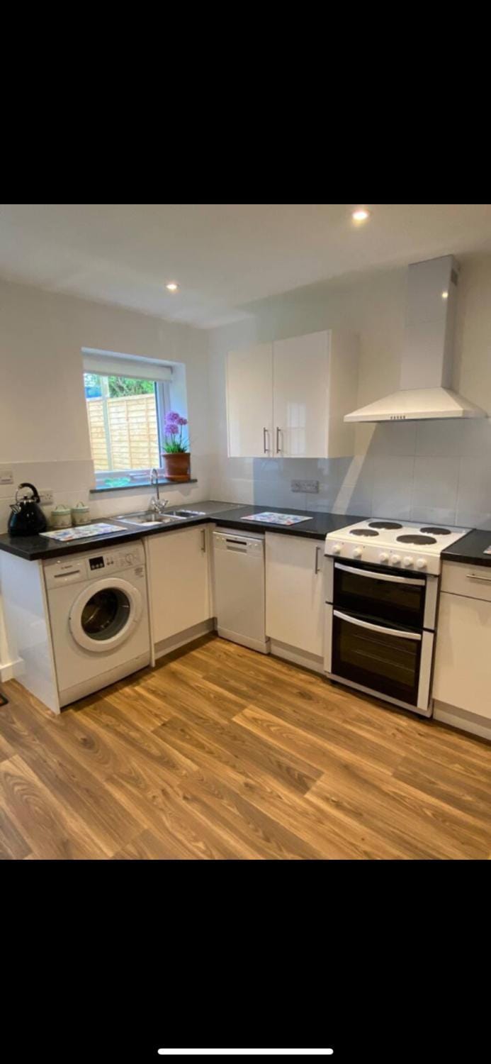 Kitchen or kitchenette, dishwasher, oven, pet friendly, stove, toaster, washing machine