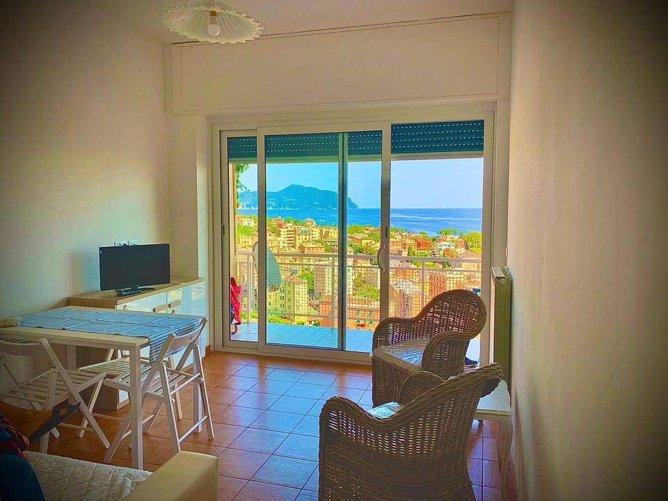 Communal lounge/ TV room, Living room, Seating area, Dining area, Sea view