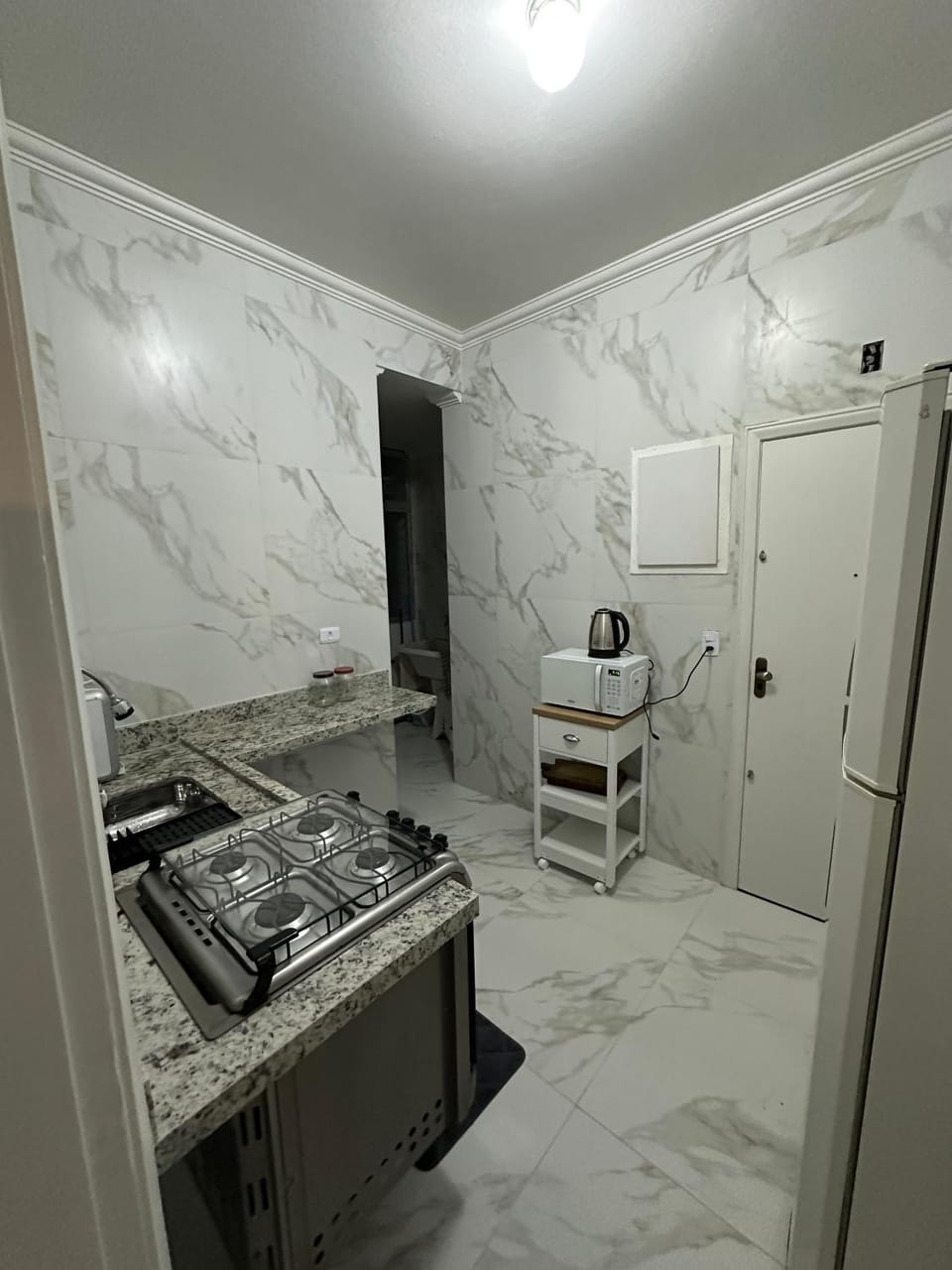 Kitchen or kitchenette, stove