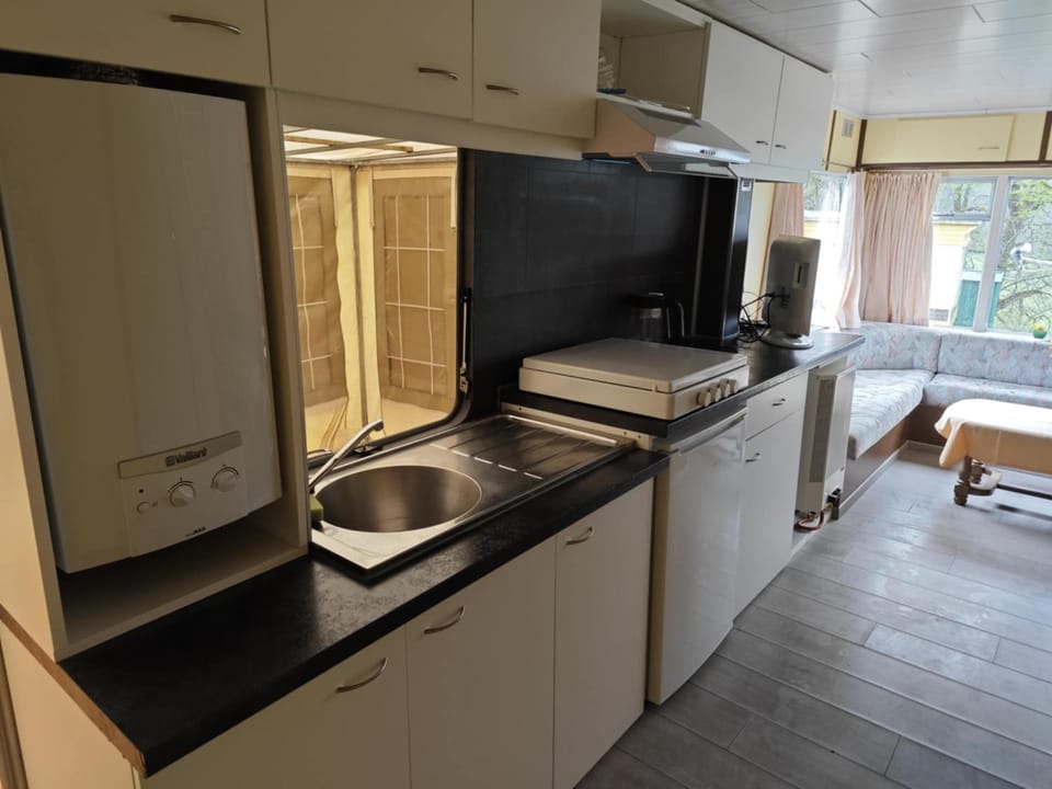 Kitchen or kitchenette, stove