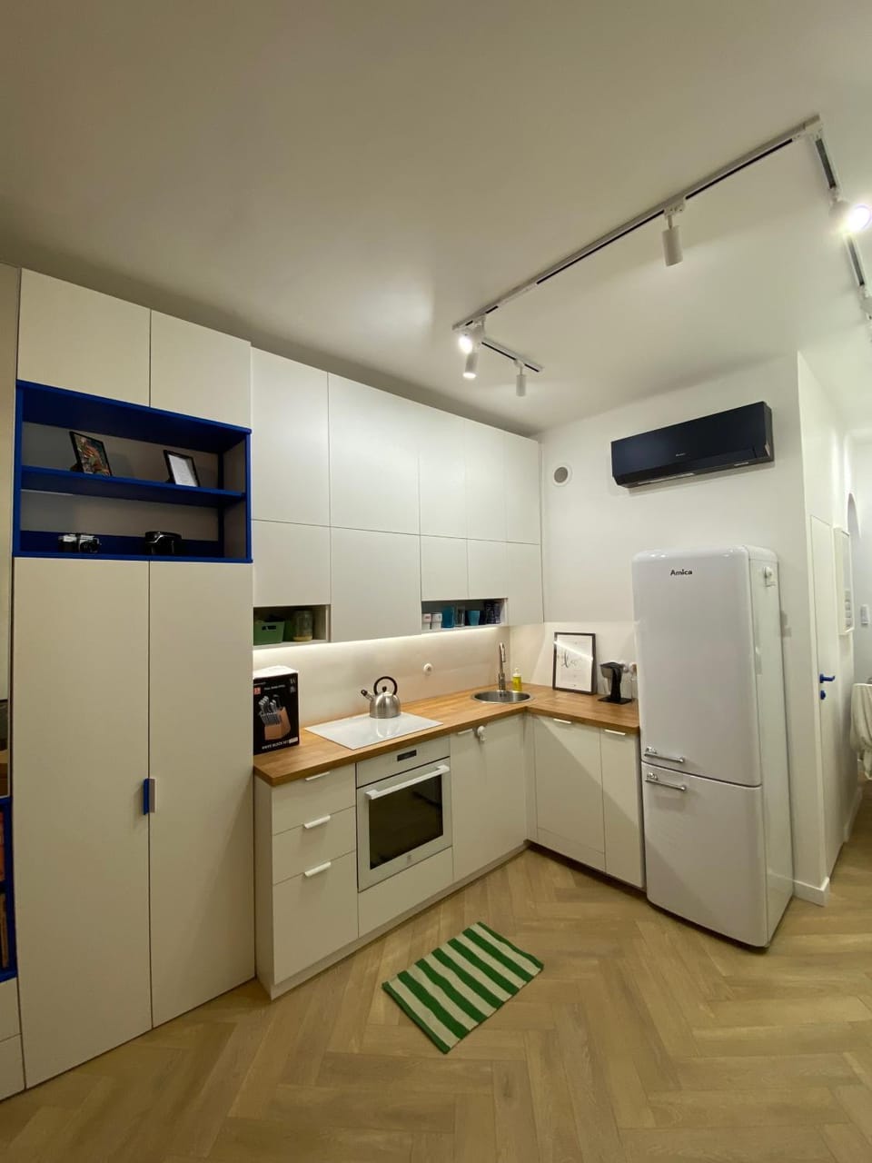 Kitchen or kitchenette, dishwasher, stove, kitchen, air conditioner