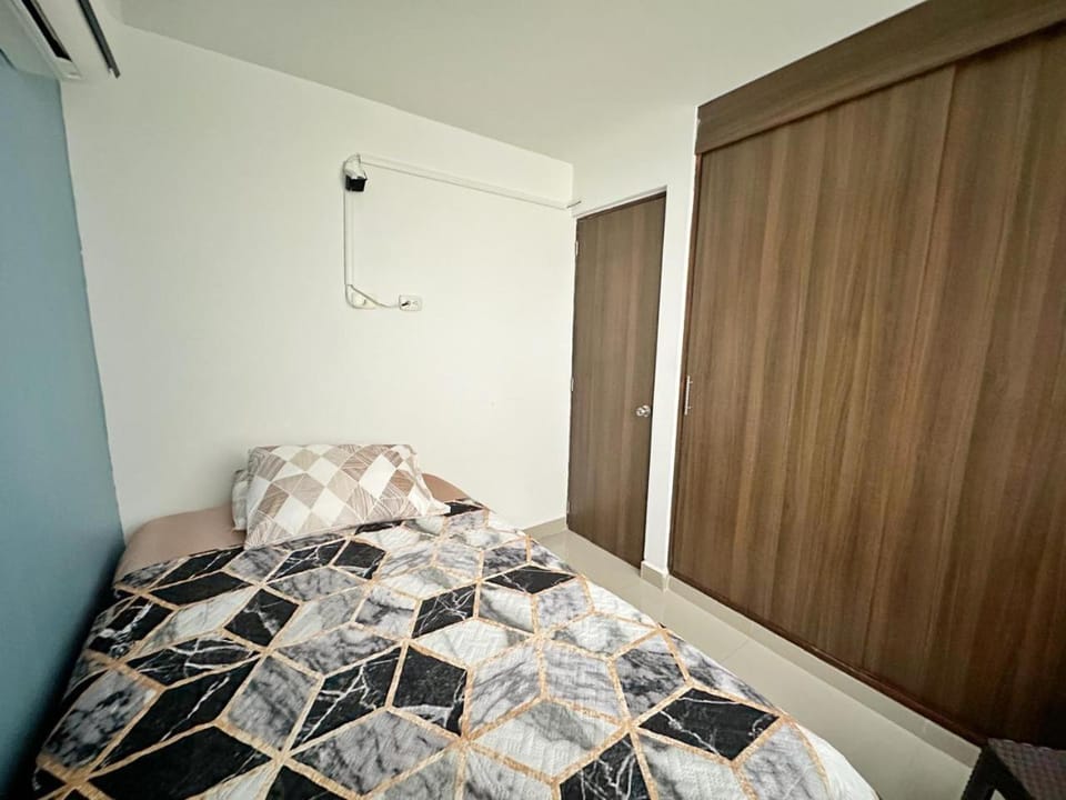 Bed, wardrobe, air conditioner