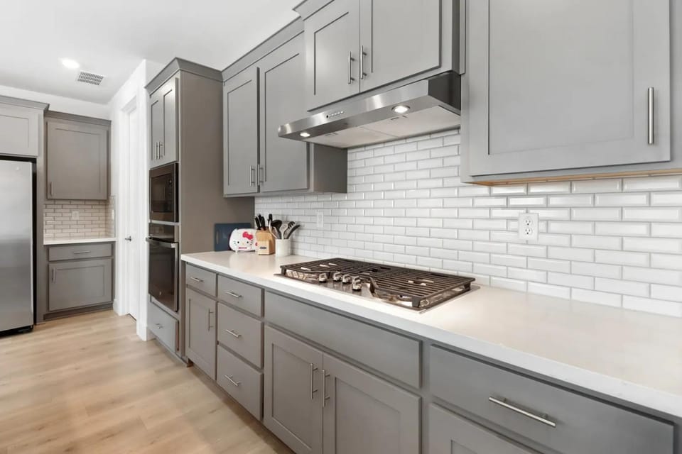 Kitchen or kitchenette, microwave, oven, stove, toaster