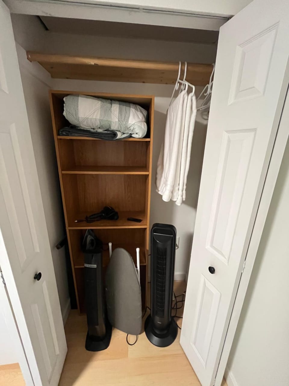 flat iron, hair dryier, storage, towels