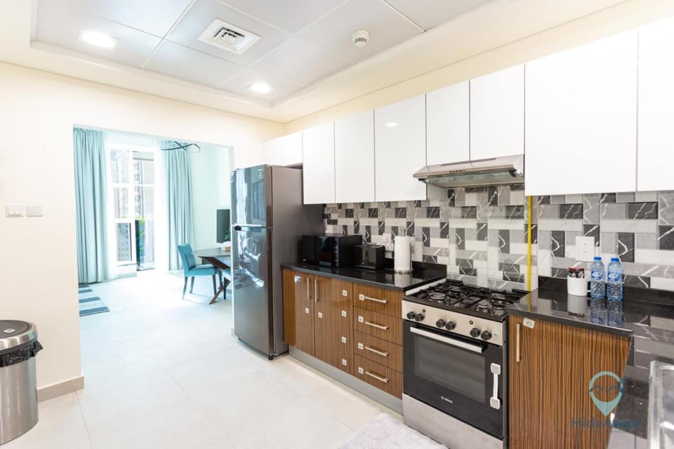 Kitchen or kitchenette, oven, stove, toaster