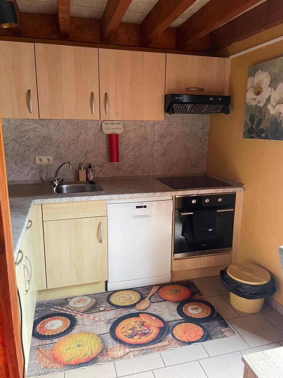 Kitchen or kitchenette, dishwasher, oven, stove