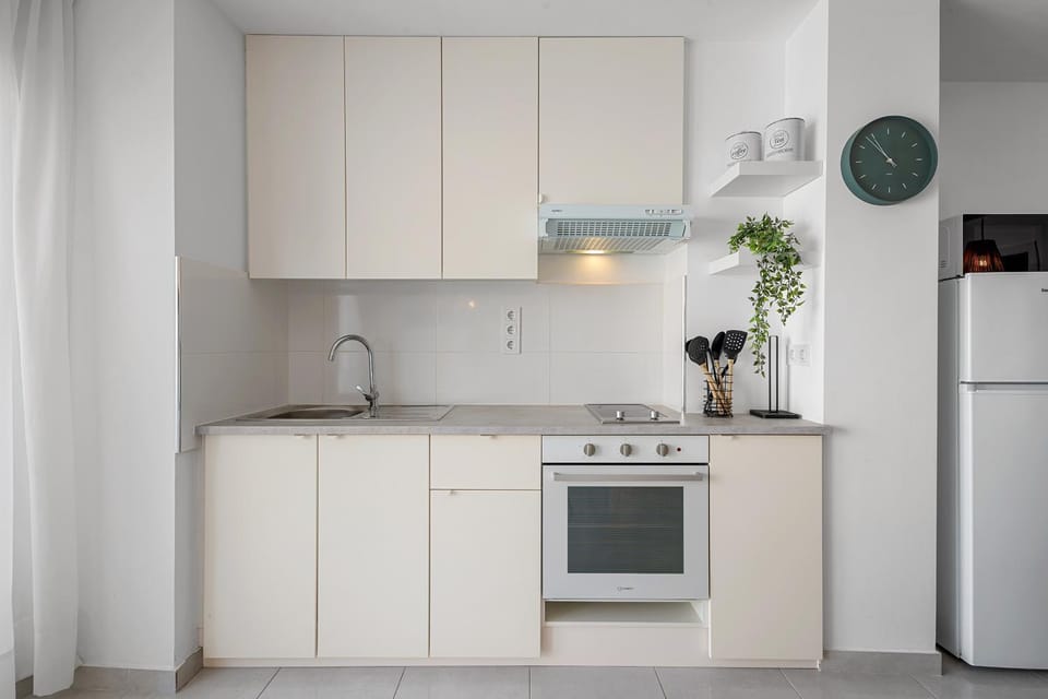 Kitchen or kitchenette, oven, stove
