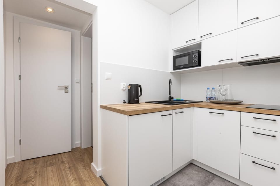 Kitchen or kitchenette, oven, stove