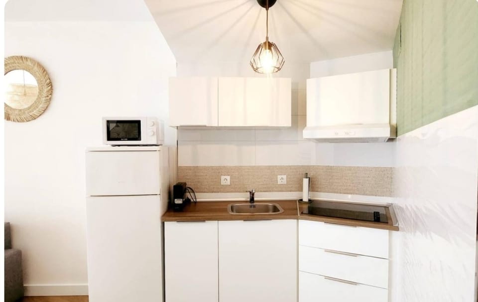 Kitchen or kitchenette, stove